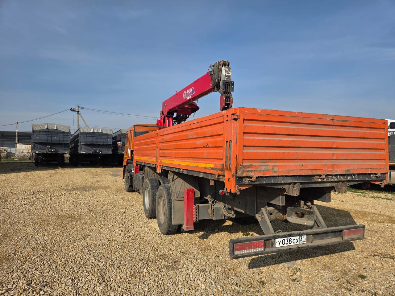 Кран центр "КАМАЗ" 6590* на шасси КамАЗ 65115 6x4 Бортовой с КМУ 2022 г. - фото 8