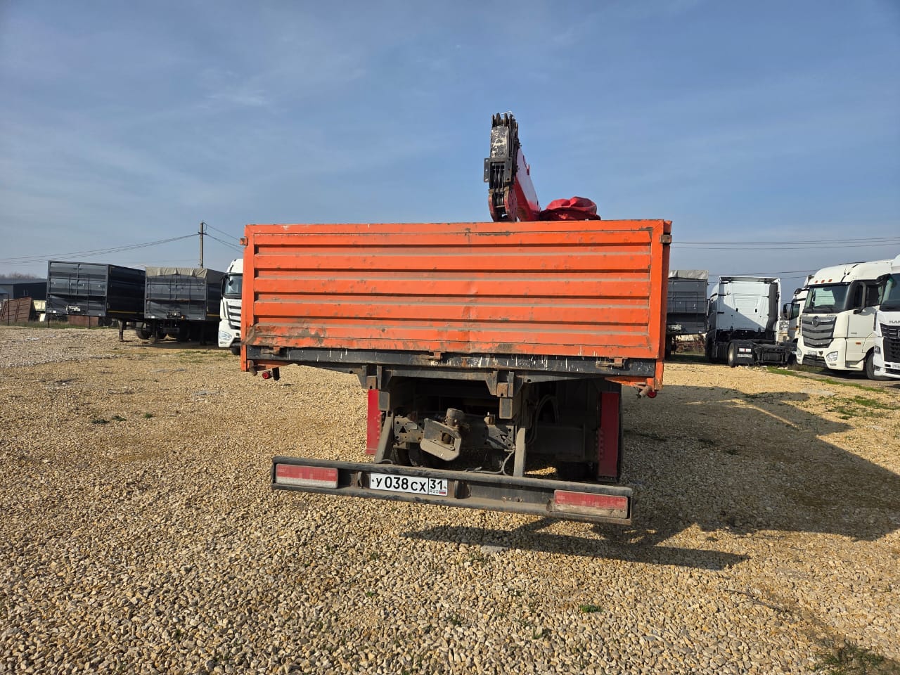 Кран центр "КАМАЗ" 6590* на шасси КамАЗ 65115 6x4 Бортовой с КМУ 2022 г. - фото 10